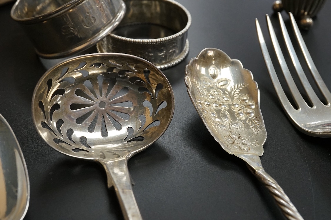 A quantity of assorted mainly 19th century flatware, various patterns, dates and makers including a set of six George III fiddle pattern table spoons by Eley, Fearn & Chawner, London, 1809, six silver fiddle pattern tabl